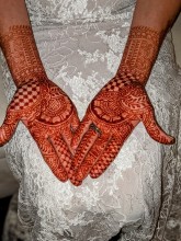 Bright maroon henna for a bride