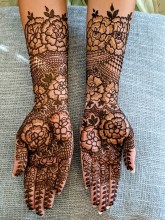 Artistic different style henna with flowers by Nisha