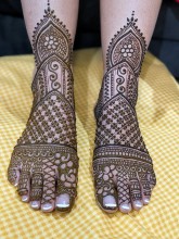 Henna on feet of bride before wedding