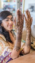 A bride showing henna by Nisha